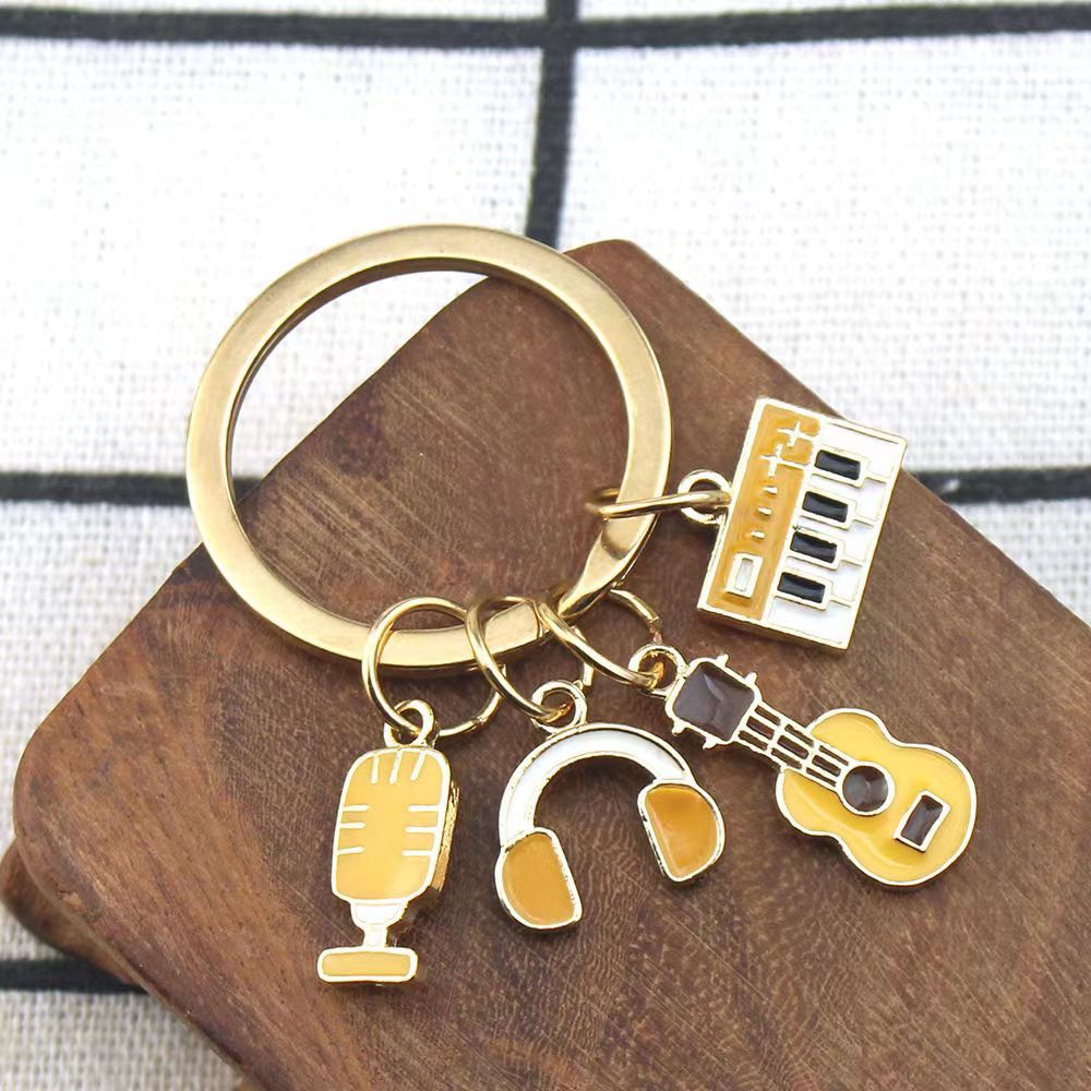 Wholesale Piano Keyboard Earphone Microphone Combination Dripping Oil Metal Keychain